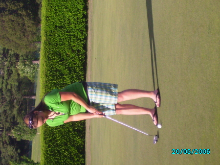 My daughter playing golf!