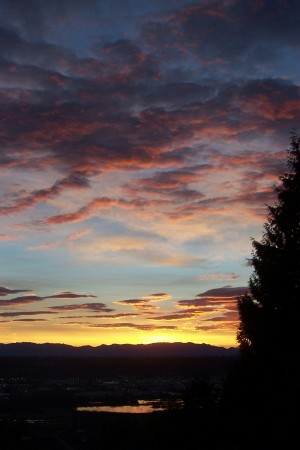 Sunrise from the deck of our house, looking at the Cascade Mountains