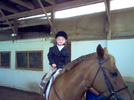 Rosie at one of her horseshows -2yrs old riding Pistol