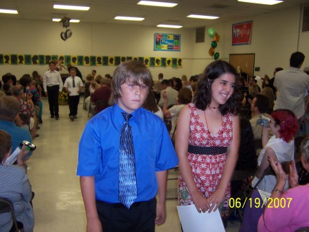 Jack Jr. grad. at middle school, try to smile there Jack!