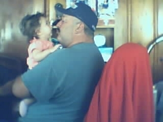 My Husband Billy and my grandbaby Angel