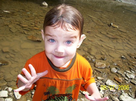 My grandson Sebastain playing in the creek