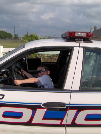 My Grandson as he stole a police car and making his escape