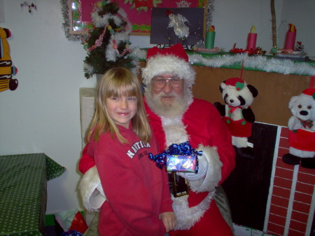 my daughter Courtney w/ santa