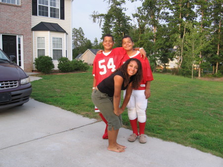 Brianna, Tyler, and Taylor after a football game