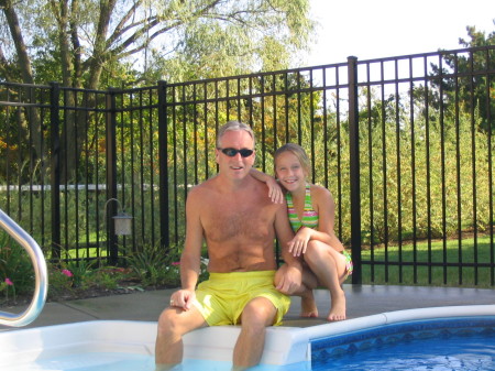 Megan Marie and dad by the pool
