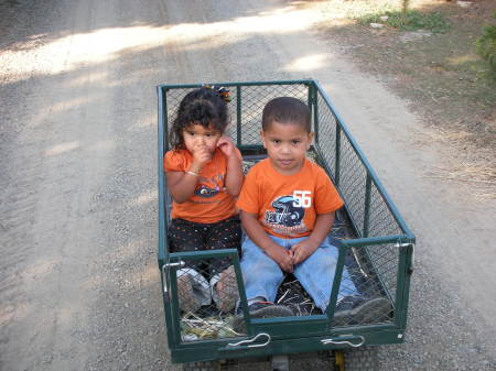 Kayla and Elijah in wagon
