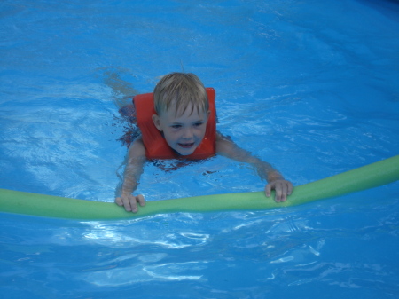 Marcus 6 playing in the pool