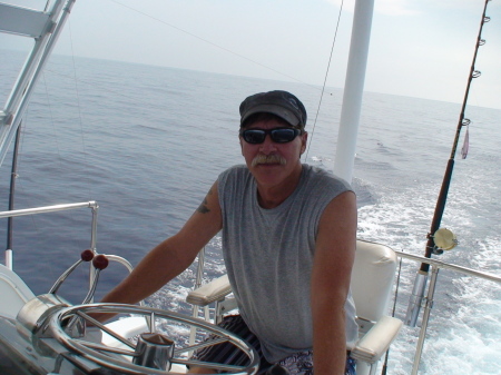 Capt Bill at the wheel in Kona