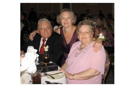 August 2006 with parents at daughter's wedding