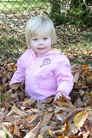 Ava in the leaves