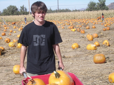 My oldest son, Kyle, at pumpkin patch; he is 14