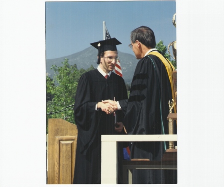 Edward receiving his college diploma