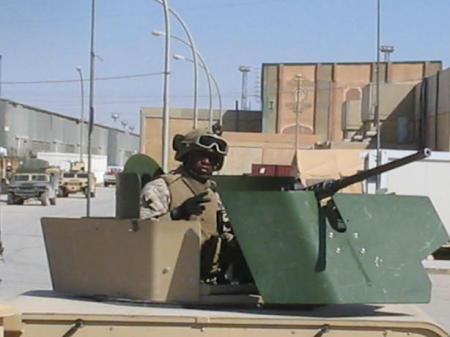 1stSgt Fulton takes a photo in Iraq (July 2005)