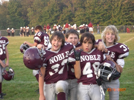 Austin(#37 in front) and friends at his football game