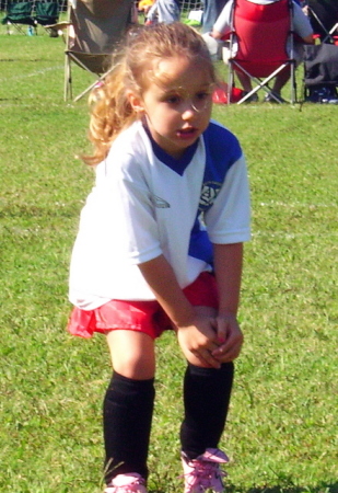 Rhea playing soccer