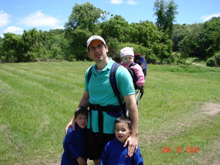 Mark and the kids on a hike
