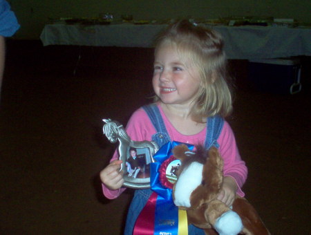 Rosie at the banquet 2006 getting her champion prizes