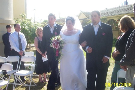 Here comes the Bride, escorted by her two handsome sons, Brandon (right side) and Chad (left side)
