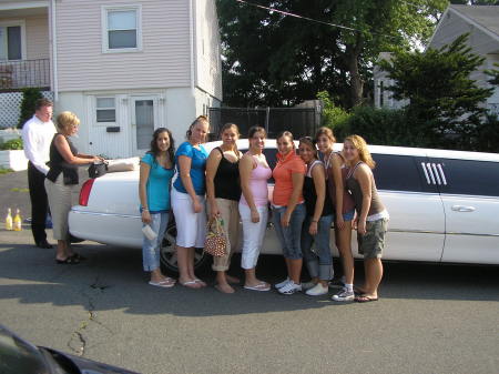 That is me paying the Limo driver for my daughter and her friends. Nicole is the one with the orange shirt.