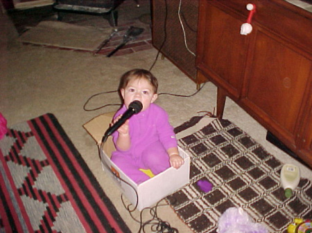 pic of amelia singing'in the box