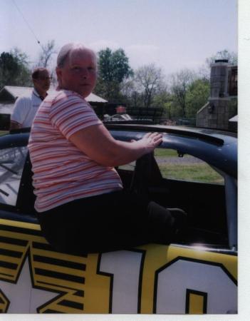 me  getting in race car at easter parade 001