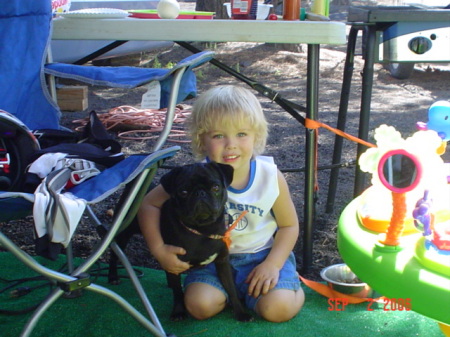 Mason with our Pug Harley