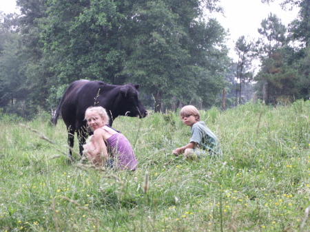 Langley and Peyton with the cows
