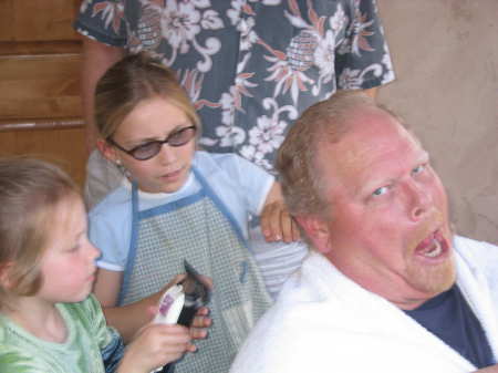 Momo getting a haircut from my girls! What a good guy...