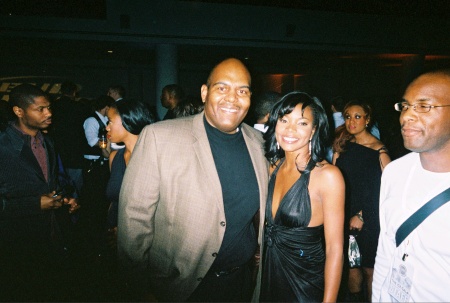 Vince escorting actress Gabrielle Union to NBA All Star Party in Denver