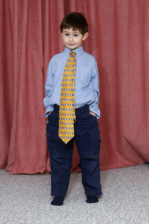 Little man with a big tie