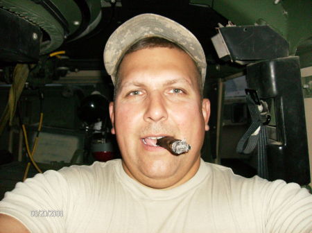 Cigar in the Humvee