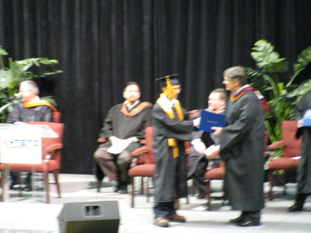 Elijah receiving his diploma