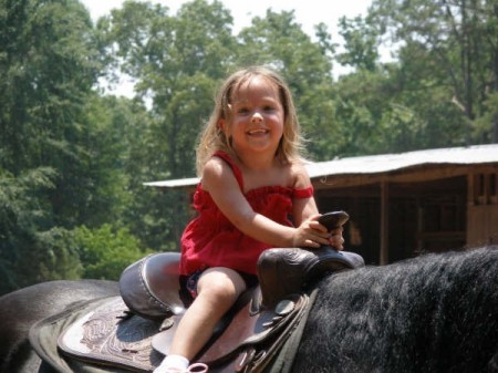 Kendra loving her first horseback ride