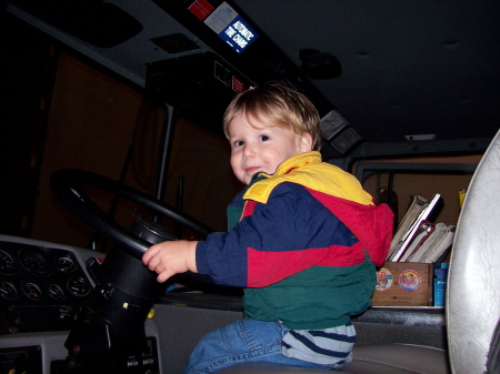 Mitchell driving my fire truck