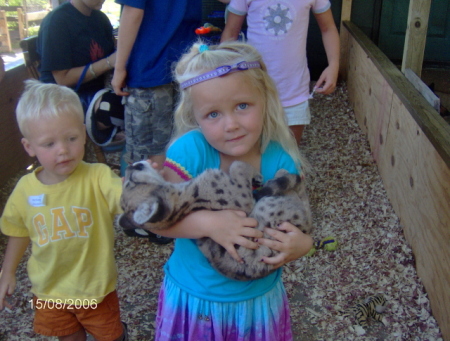 Baleigh Holding a baby Cougar