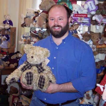 Showing off a bear in the gift shop