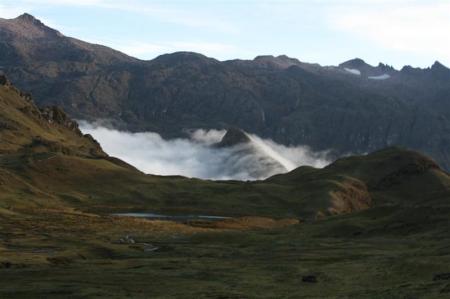 Clouds blowing through a valley in the Andes