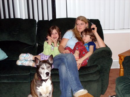 3 of my children, and dog, watching the teli.