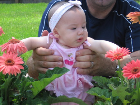 Giana smelling the flowers....