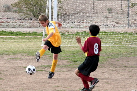 Chandler playing soccer.