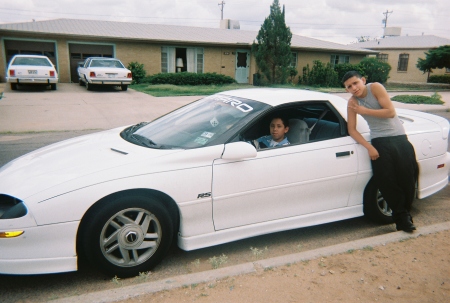 Jesus Castaneda Jr. (outside the car)