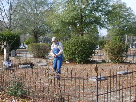 Cleaning up plot in cemetery