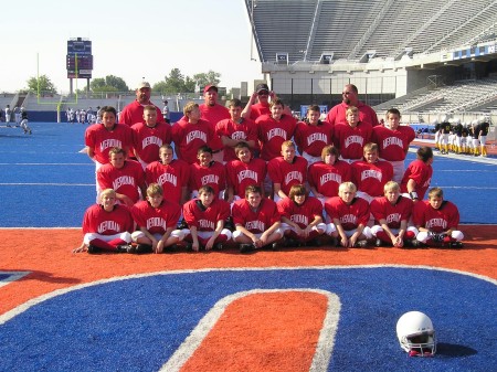 lowells football team and son at end by him