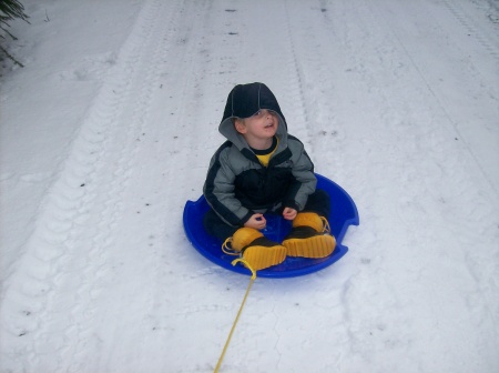 My Son sledding in the snow!