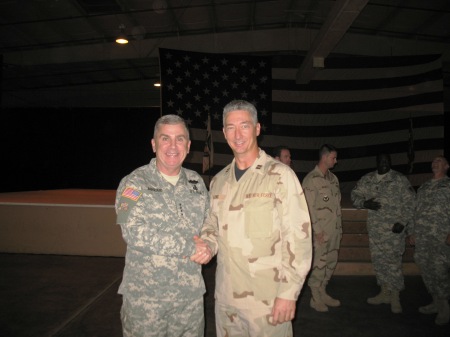 My husband Jimmy (right) worked for Gen Abazaid while deployed to Qatar 2006