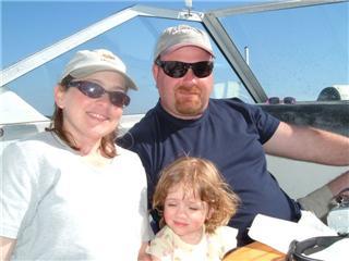 Me, Mike and Ripley on boat in FL