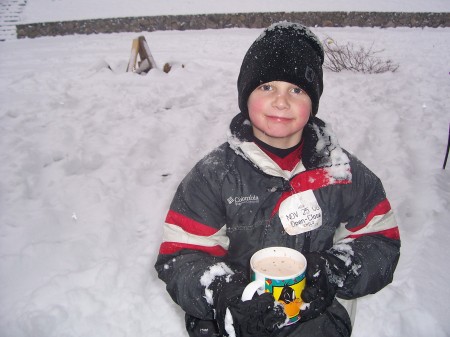 Brandon (My Youngest) In our backyard playing in the snow