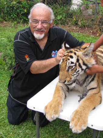 GEORGE WITH PET TIGER CUB