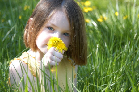 Eva with dandelion